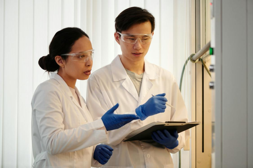 Two Researchers Discussing a Development in a Lab Setting