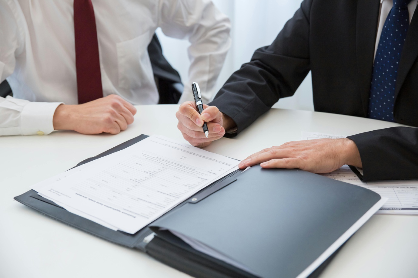 9 Essential Clauses to Protect Your Business in Contracts