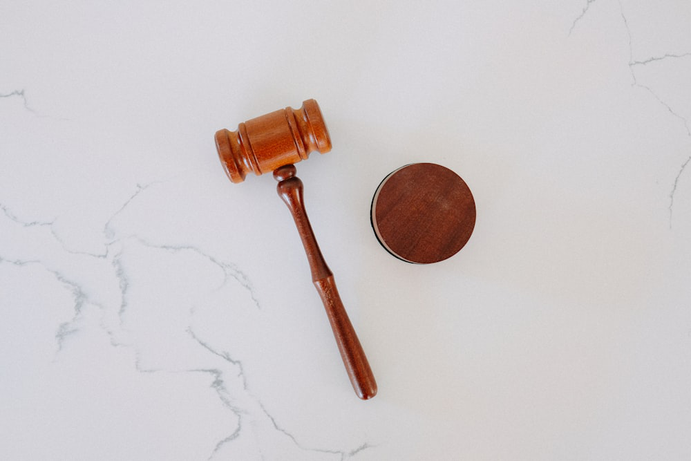 Gavel on a white surface