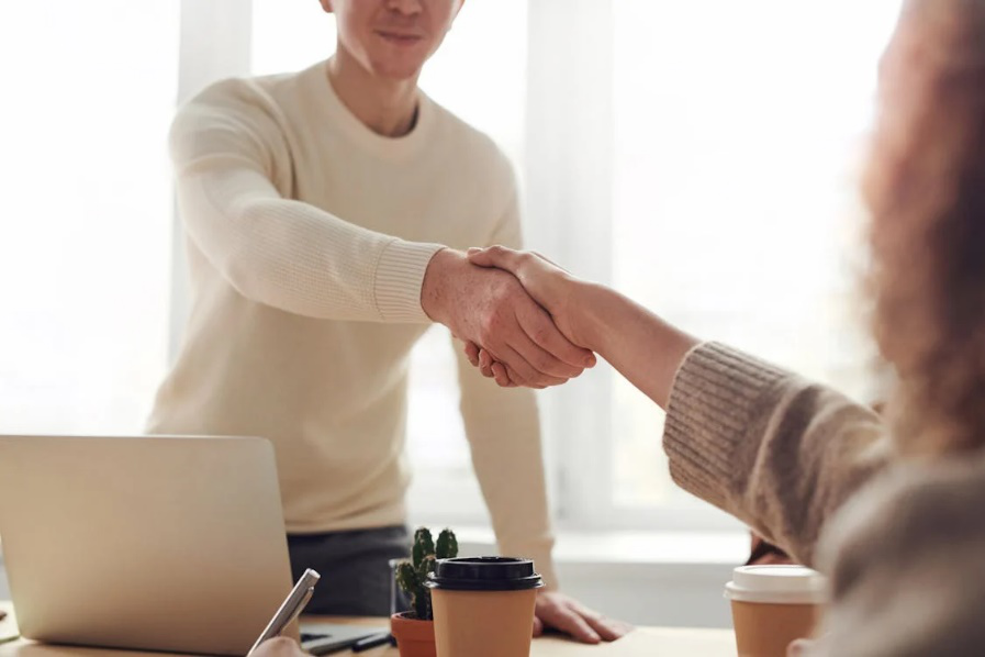  An image of people shaking hands